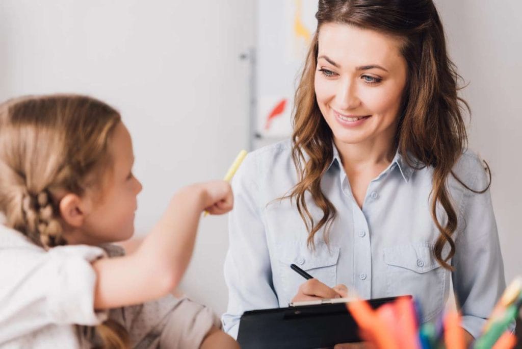 School counselor with young student 